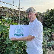 Peter Burks, GCA Chief Executive with the body's 60th anniversary logo